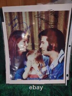 VERY RARE ELVIS, PRISCILLA, LISA PRESLEY AUTOGRAPHS 8 X 10 INCHES. WithCERT
